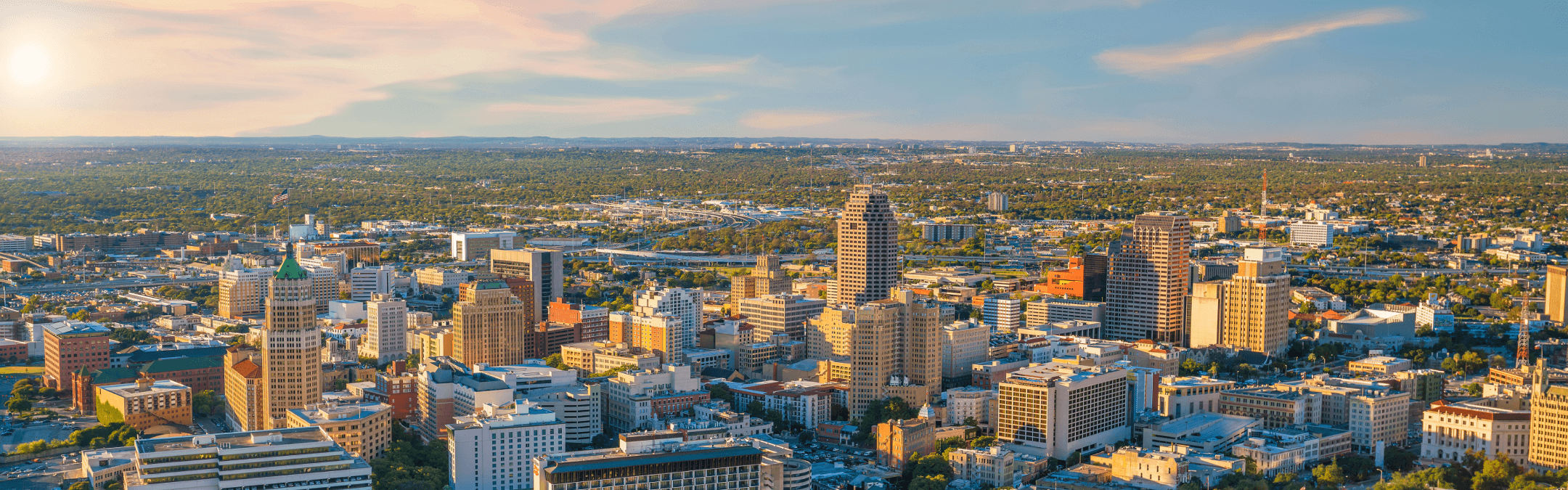 Aerial view of the downtown San Antonio skyline at sunset